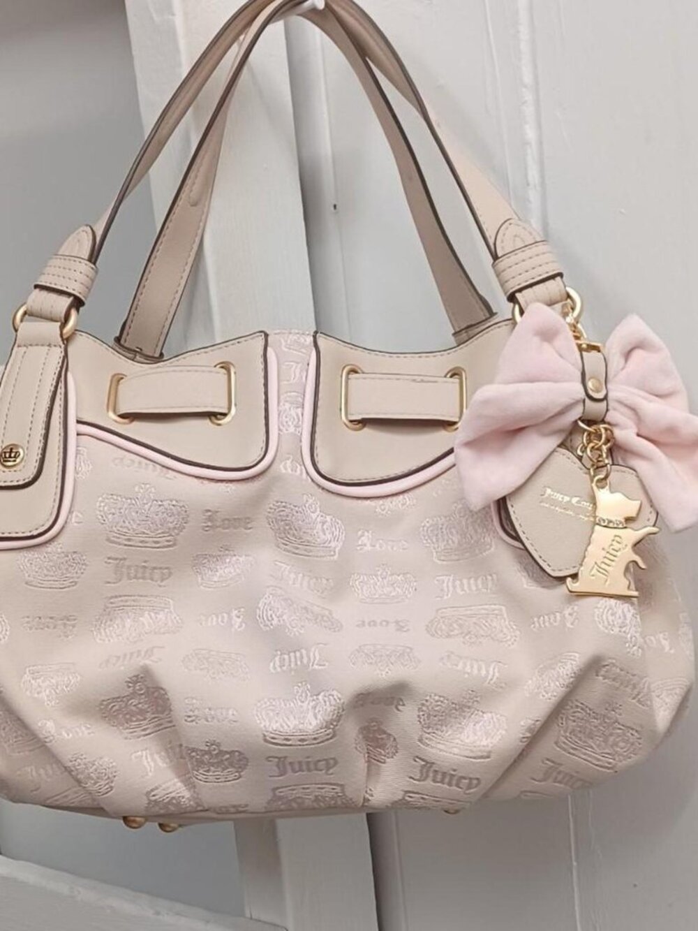 exclusive Y2K Juicy Couture tan with pink bow and charm bag